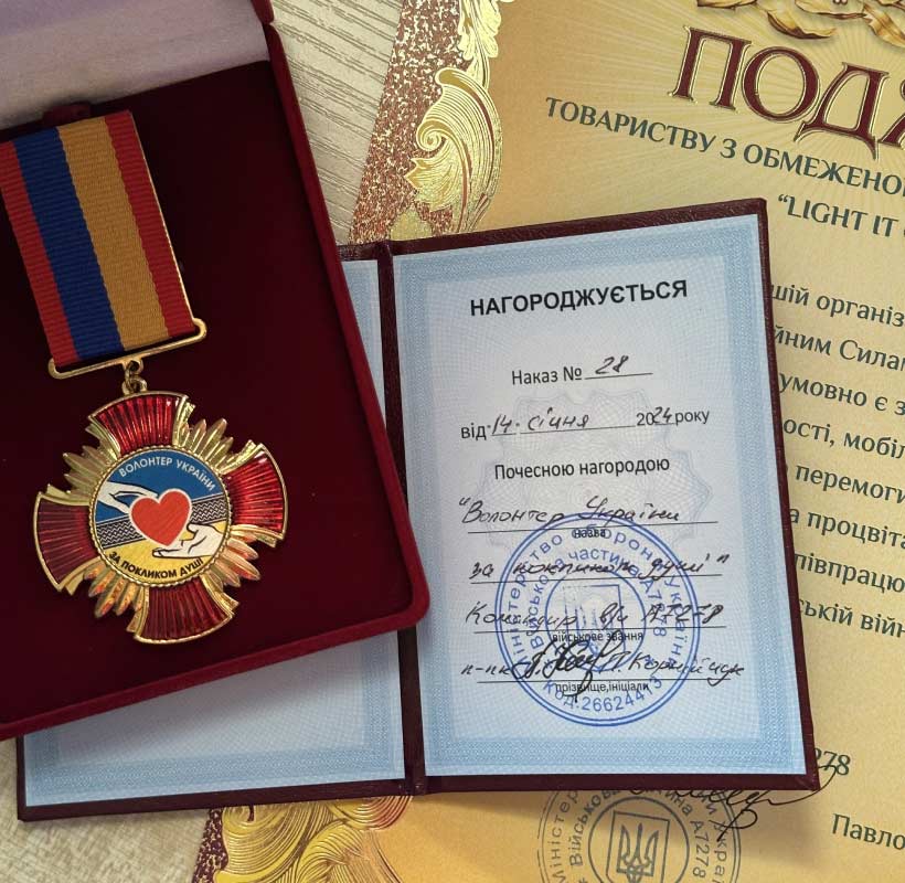 Medal and letter of recognition for Light IT Global